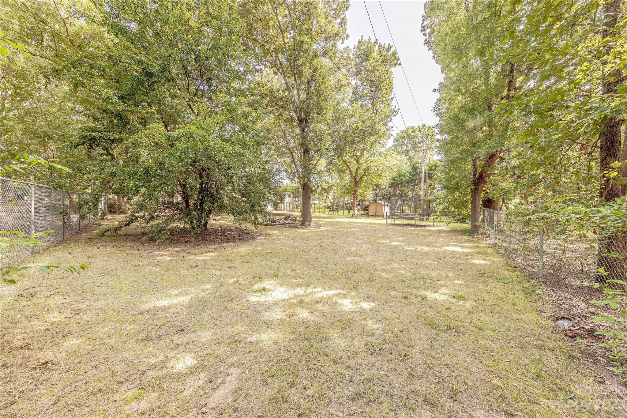 1702 Carson Street Monroe, NC 28110 - Photo 29 of 29 a view of outdoor space with trees