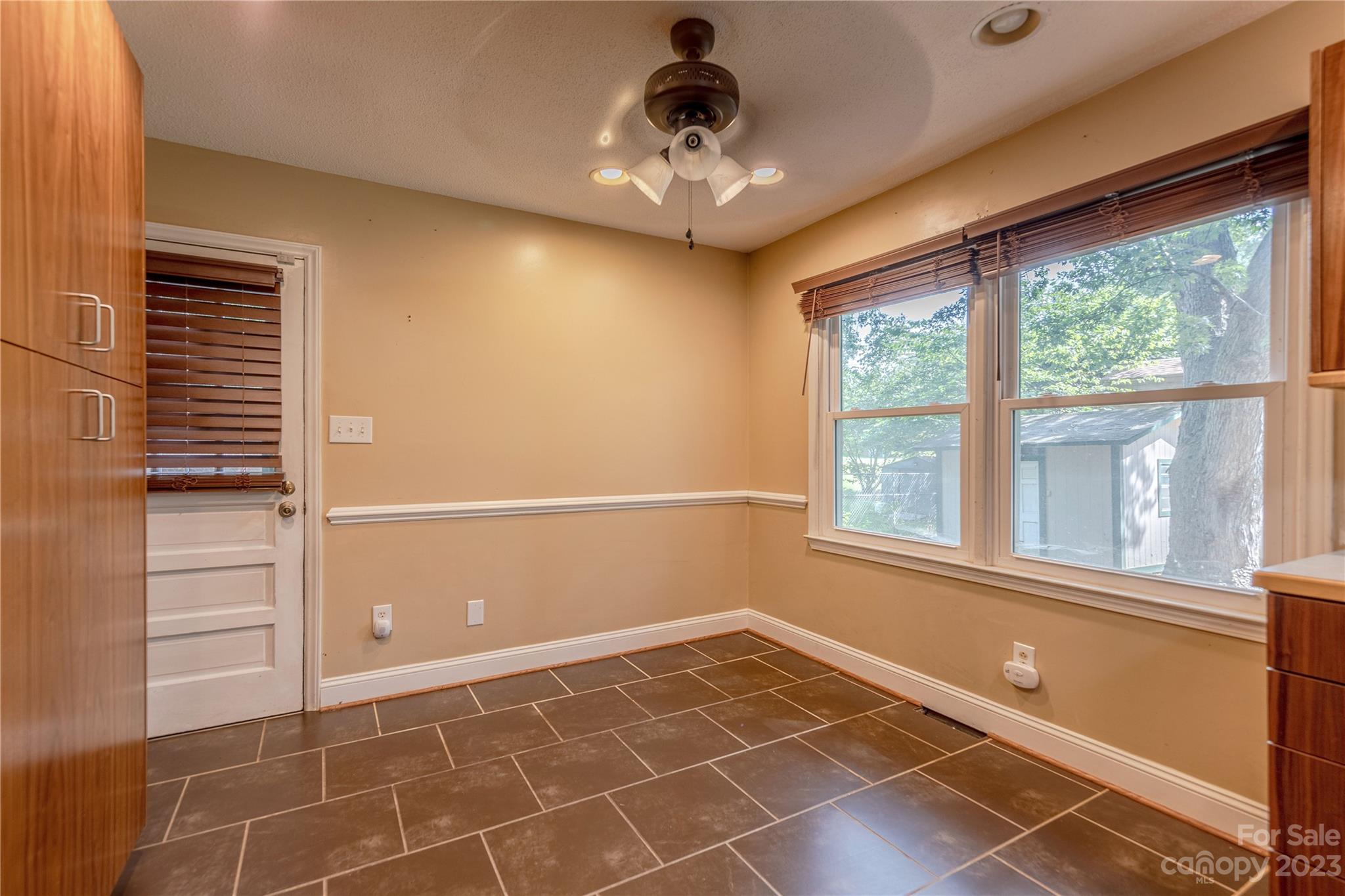 1702 Carson Street Monroe, NC 28110 - Photo 7 of 29 a view of an empty room with a window