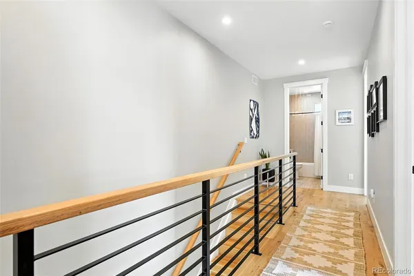a hallway with wooden floor