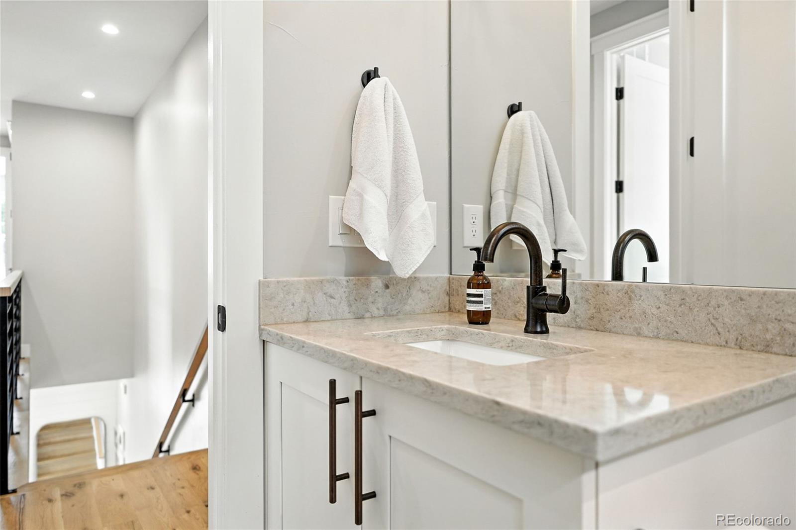 4516 Stuart Street Denver, CO 80212 - Photo 20 of 46 a close view of sink and tap