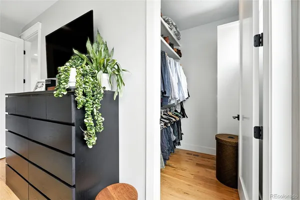 a view of entryway with wooden floor