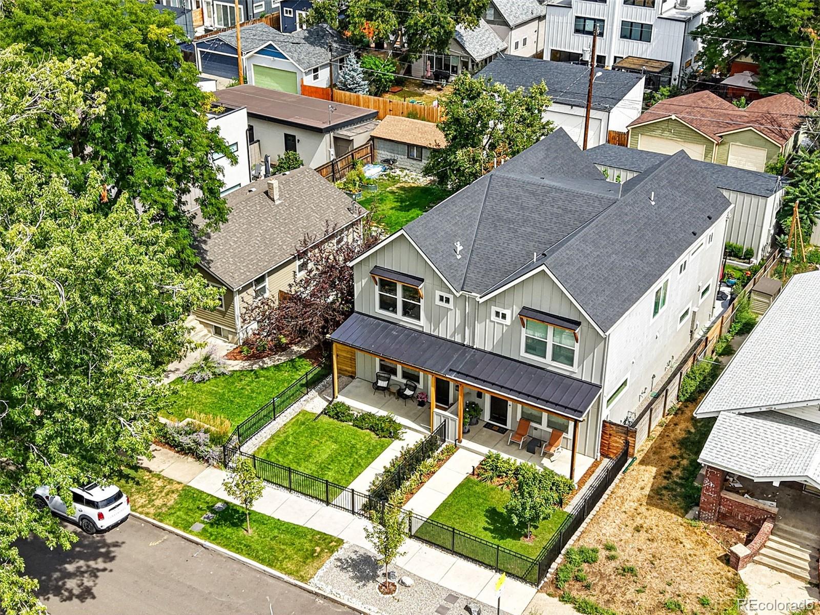 4516 Stuart Street Denver, CO 80212 - Photo 40 of 46 an aerial view of a house with a big yard