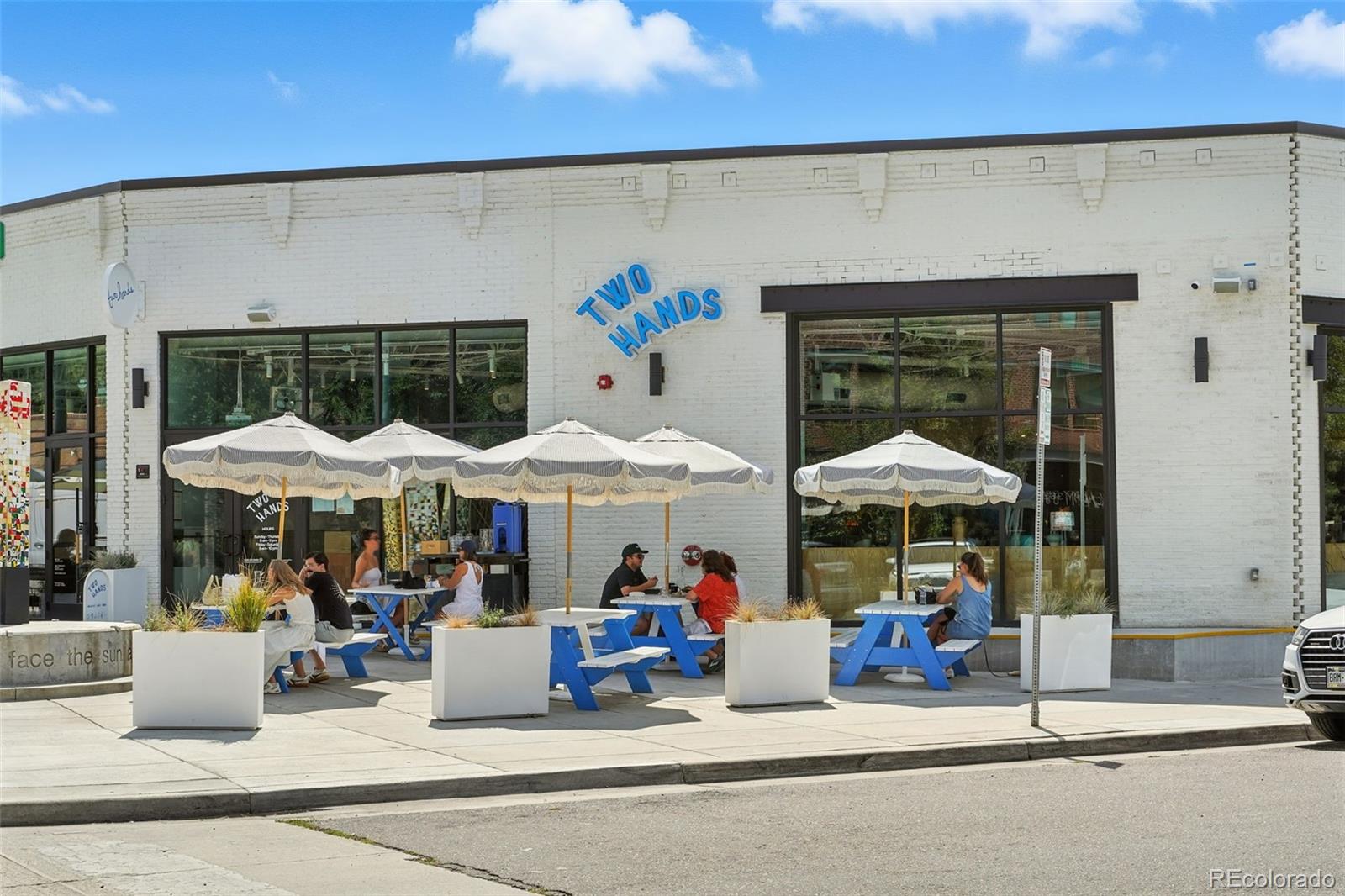 4516 Stuart Street Denver, CO 80212 - Photo 44 of 46 a view of people sitting under an umbrella