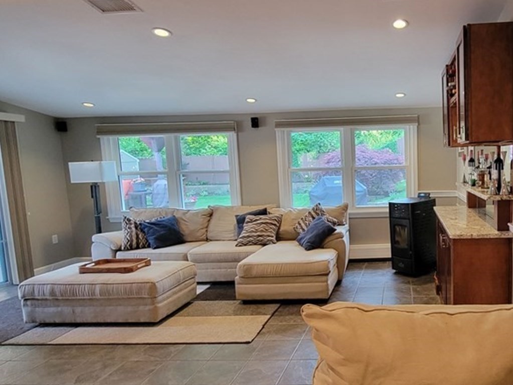 22 Ledgewood Road Wakefield, MA 01880 - Photo 3 of 34 a living room with furniture and a large window