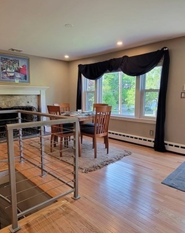 22 Ledgewood Road Wakefield, MA 01880 - Photo 7 of 34 a living room with furniture and a large window