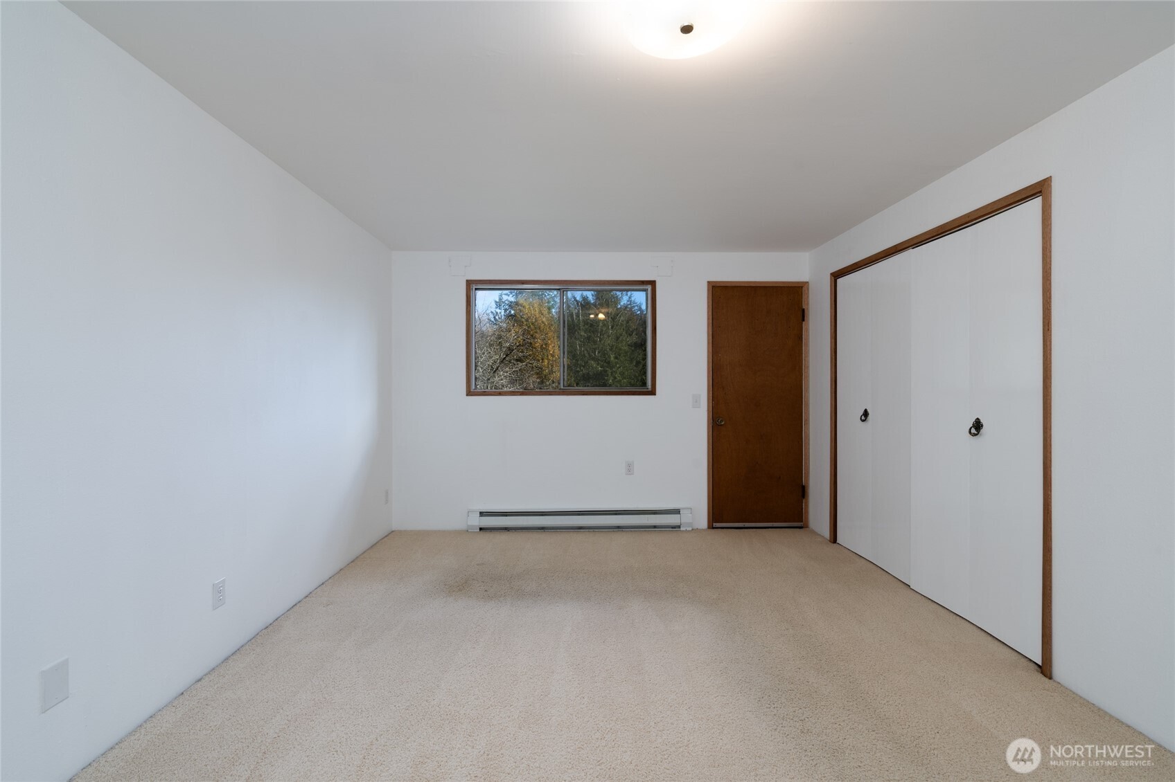 22491 Grip Road Sedro-Woolley, WA 98284 - Photo 28 of 40 a view of an empty room with windows