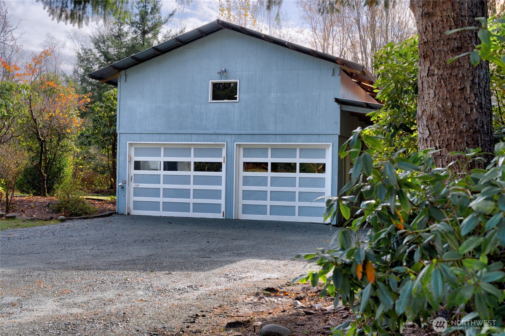 22491 Grip Road Sedro-Woolley, WA 98284 - Photo 35 of 40 a house with a lot of plants in front of it