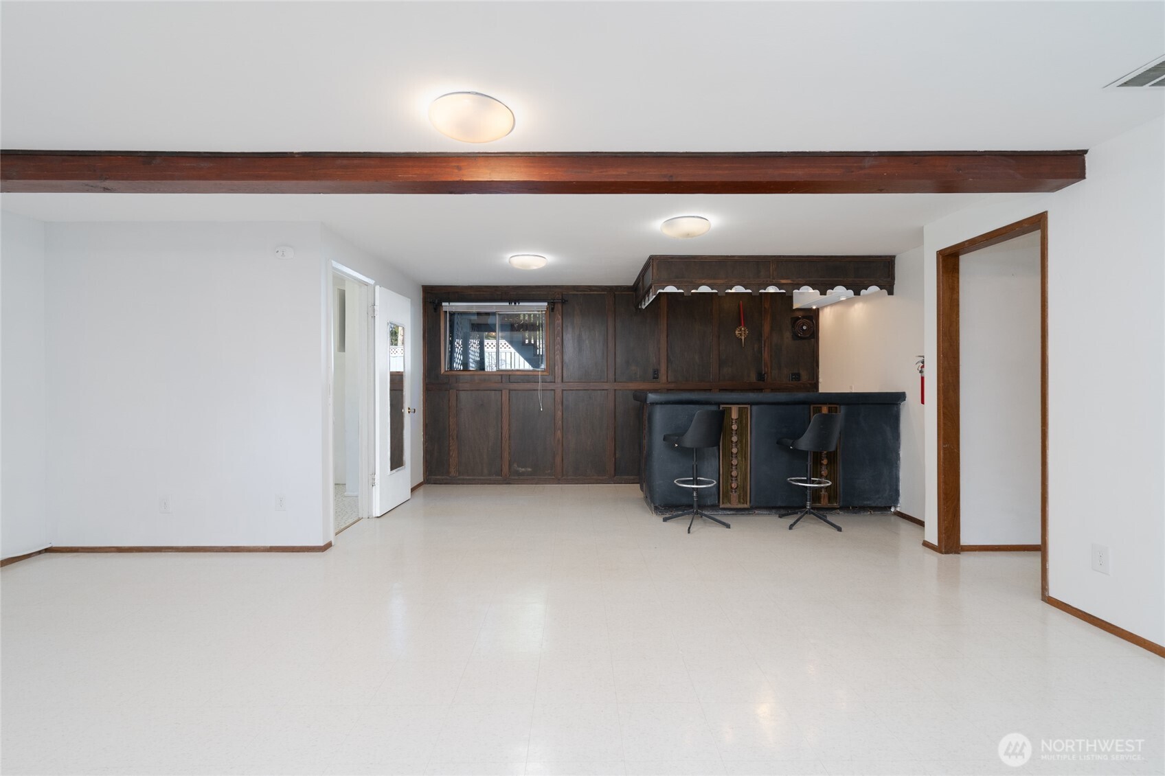 22491 Grip Road Sedro-Woolley, WA 98284 - Photo 8 of 40 an empty room with a empty space and windows
