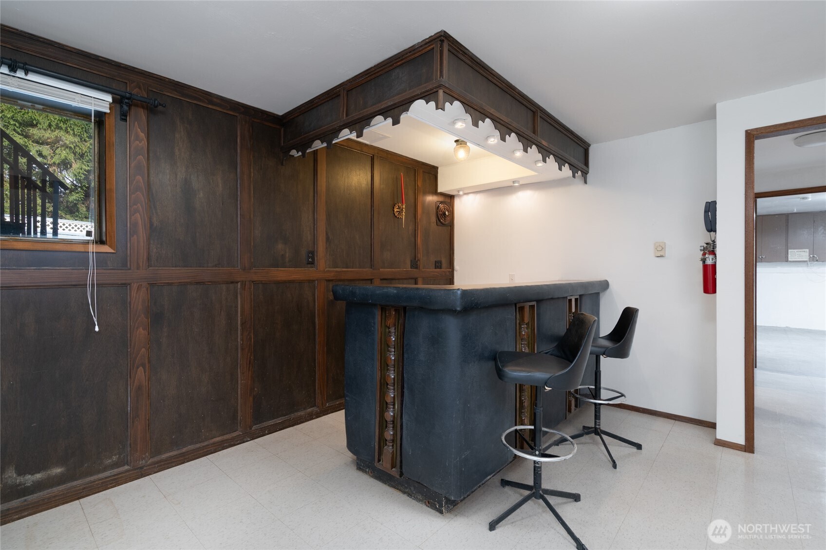 22491 Grip Road Sedro-Woolley, WA 98284 - Photo 9 of 40 a view of a workspace with furniture and a window