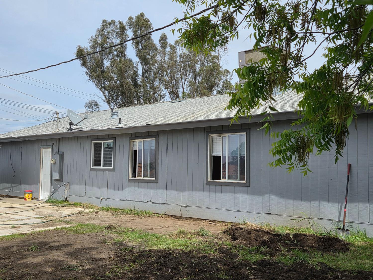 5010 Powerline Road, Unit D Olivehurst, CA 95961 - Photo 3 of 12 a house that has a tree in front of it