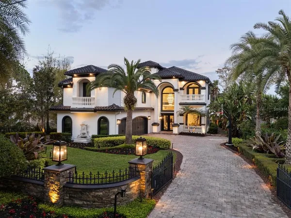 front view of a house with a garden