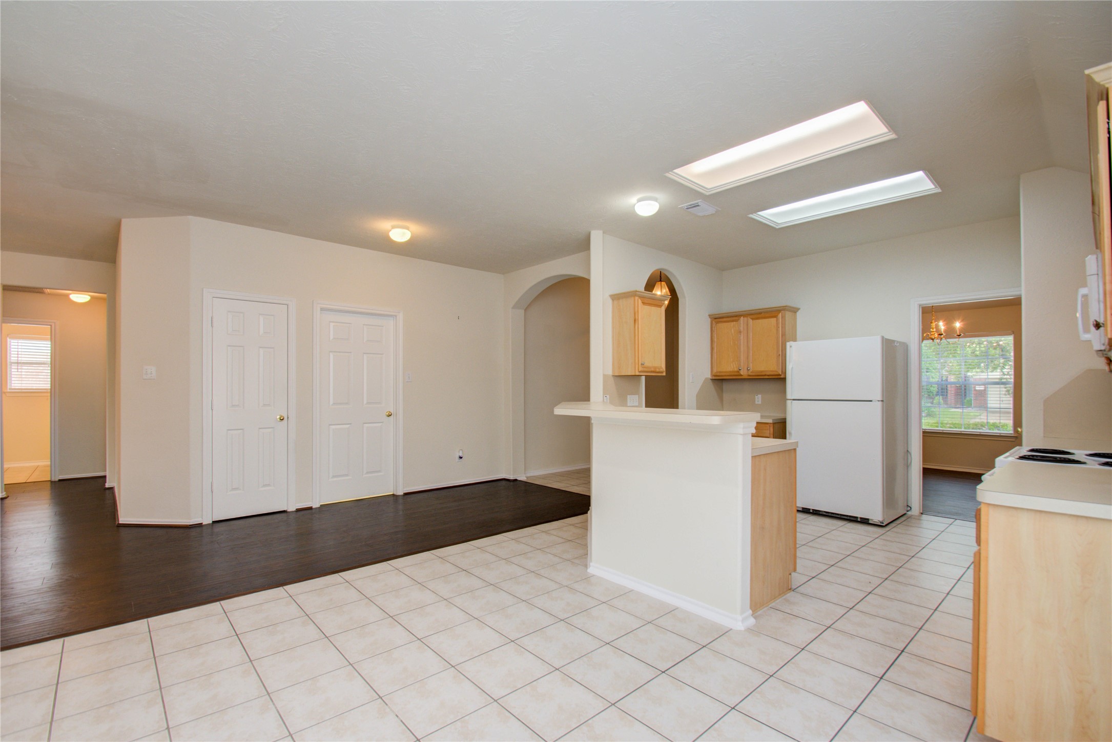 5715 Afton Ridge Lane Houston, TX 77084 - Photo 12 of 37 a view of a kitchen with furniture and an empty room