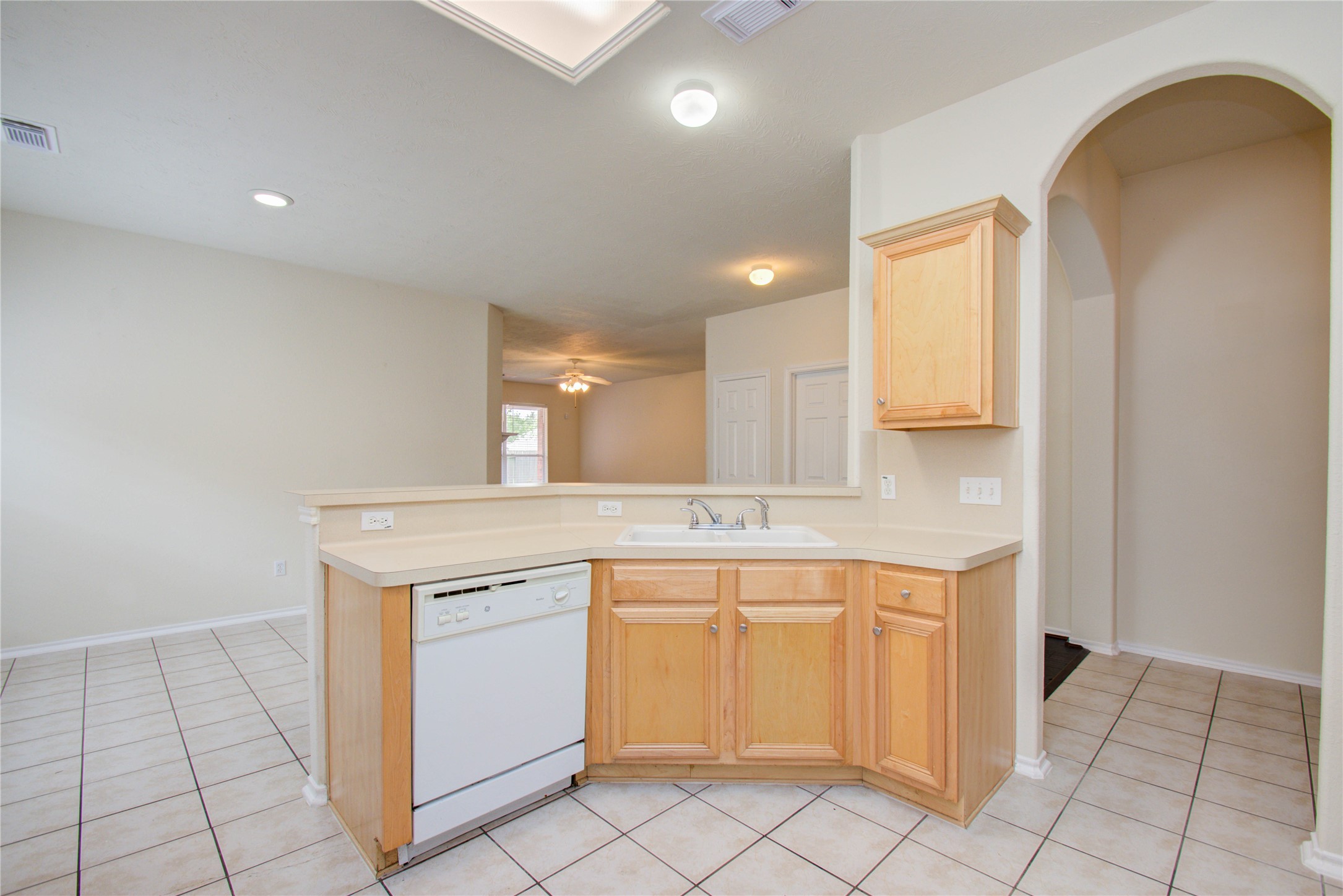 5715 Afton Ridge Lane Houston, TX 77084 - Photo 17 of 37 a view of a kitchen with white cabinets
