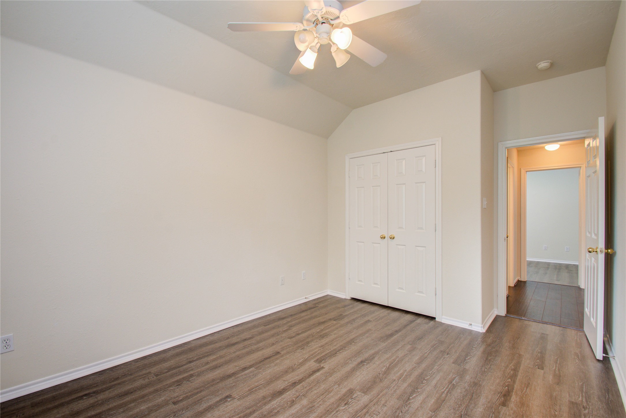 5715 Afton Ridge Lane Houston, TX 77084 - Photo 31 of 37 wooden floor in an empty room with a window