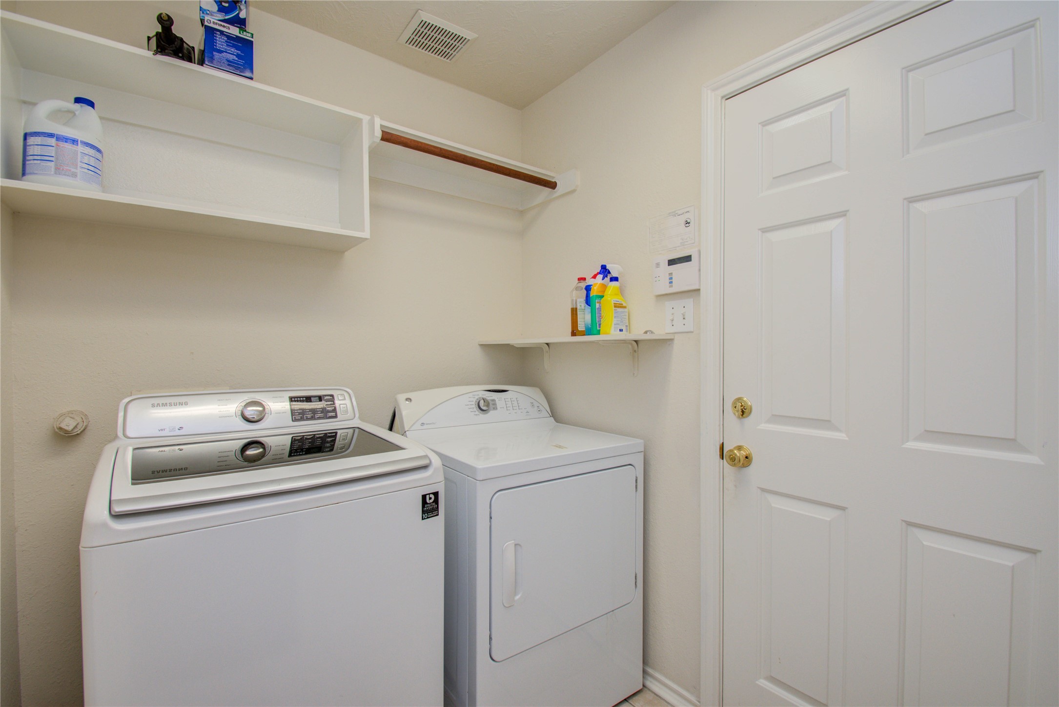 5715 Afton Ridge Lane Houston, TX 77084 - Photo 37 of 37 a utility room with dryer and washer