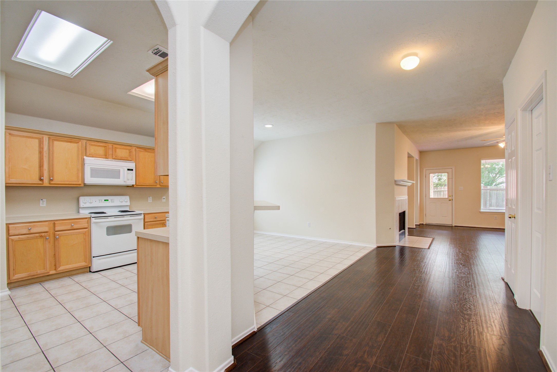 5715 Afton Ridge Lane Houston, TX 77084 - Photo 9 of 37 a view of a kitchen with a sink and a stove top oven