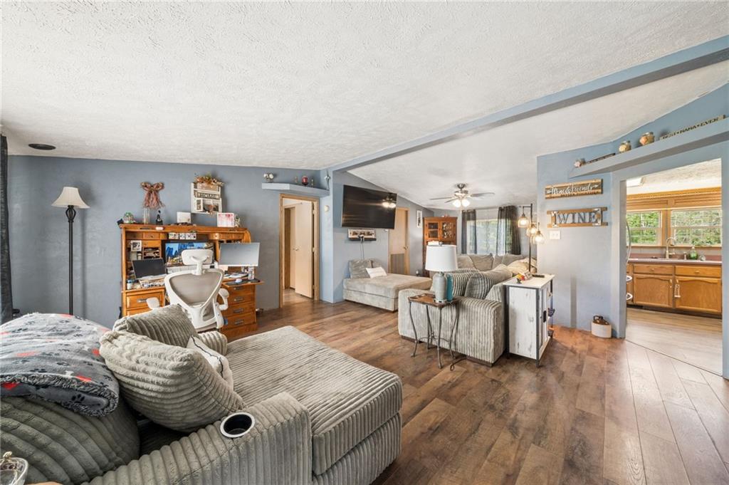 275 Adamik Road Clarksville, PA 15322 - Photo 25 of 39 a bedroom with furniture and a large window