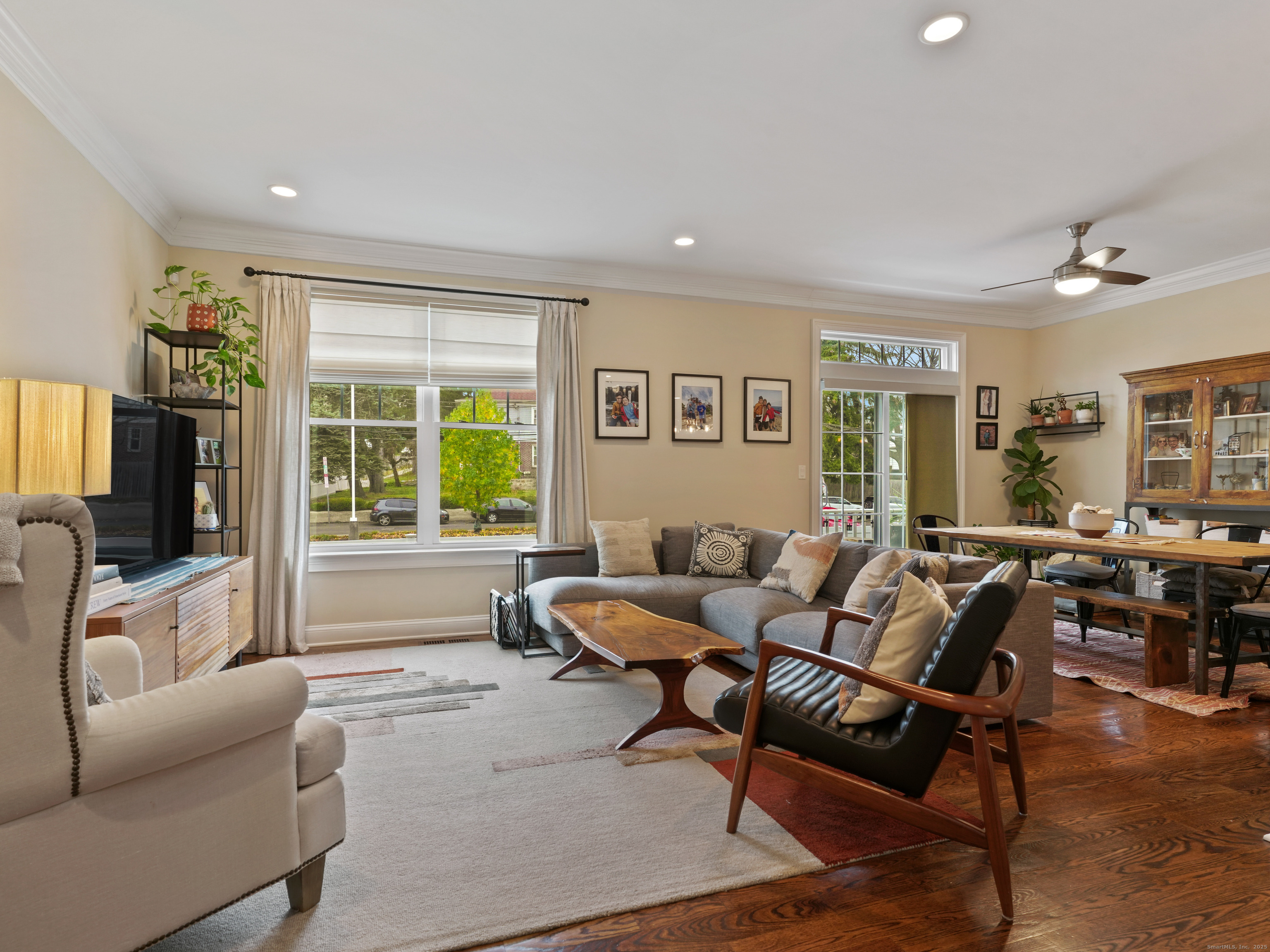 91 West Broad Street, Unit 11 Stamford, CT 06902 - Photo 11 of 26 a living room with furniture and a window