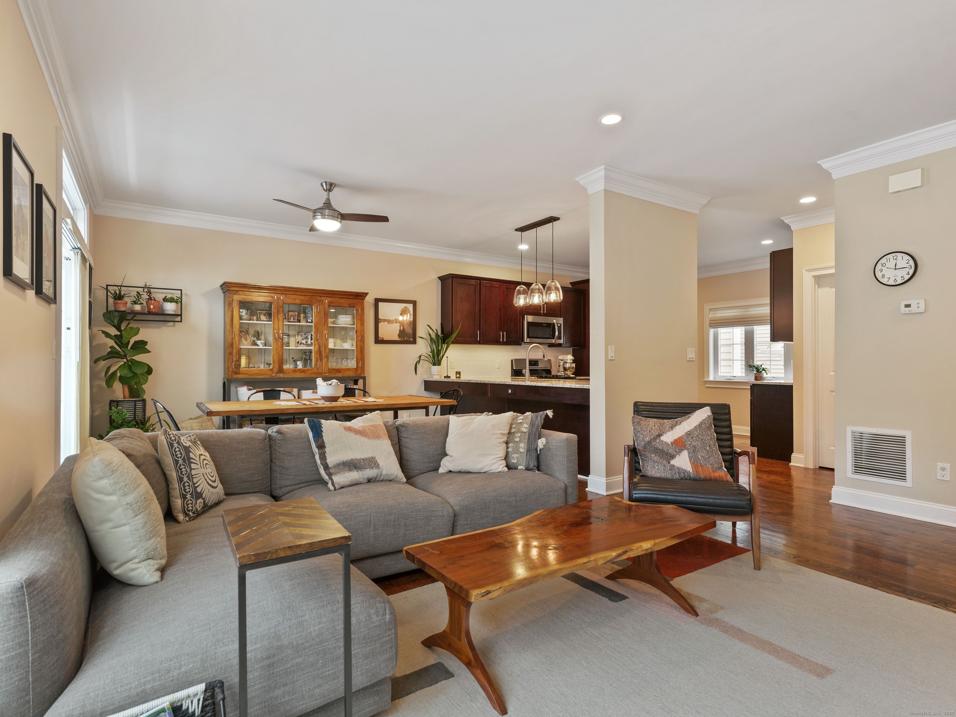 91 West Broad Street, Unit 11 Stamford, CT 06902 - Photo 12 of 26 a living room with furniture and kitchen view