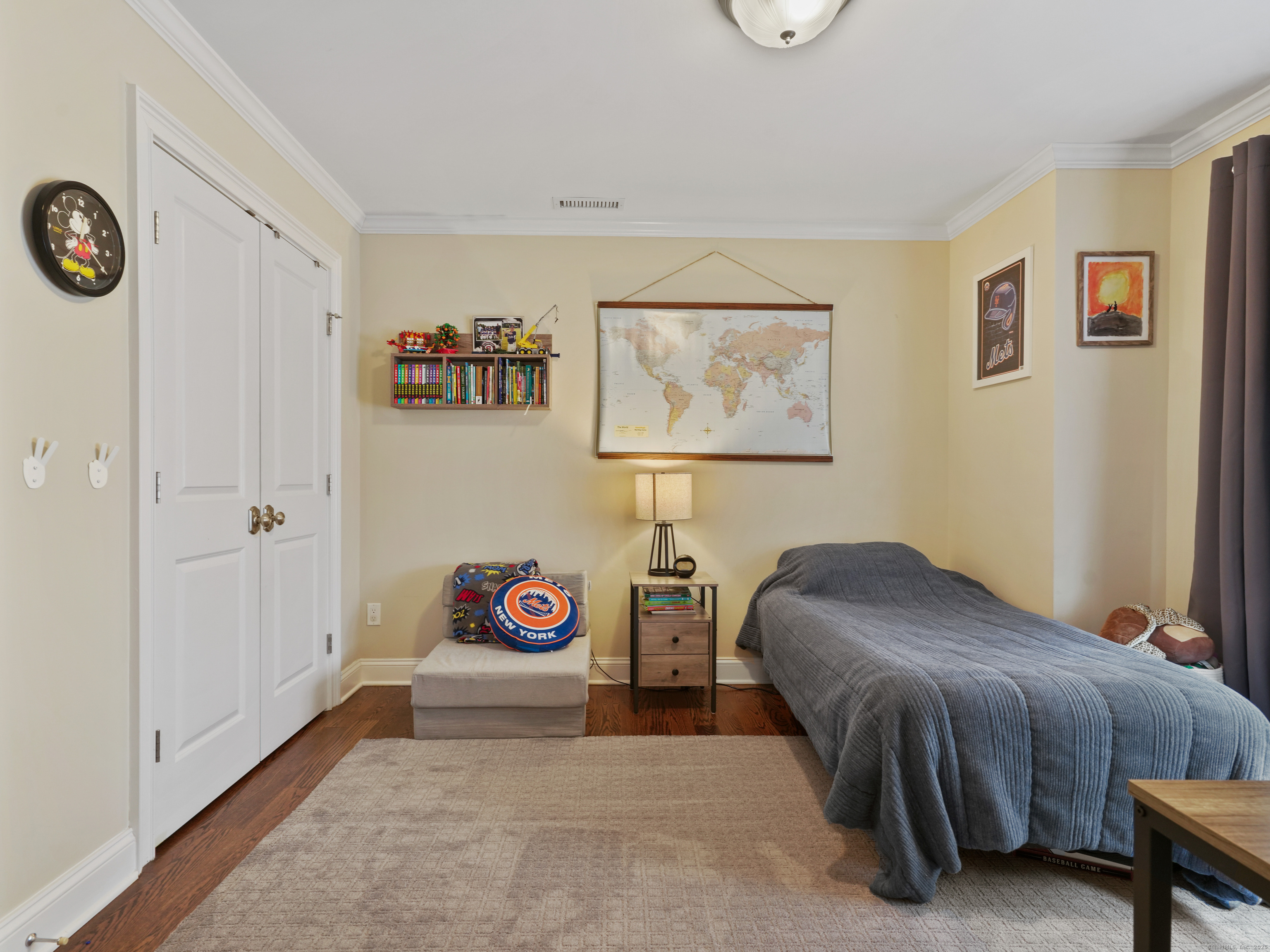 91 West Broad Street, Unit 11 Stamford, CT 06902 - Photo 15 of 26 a bedroom with a bed and a table