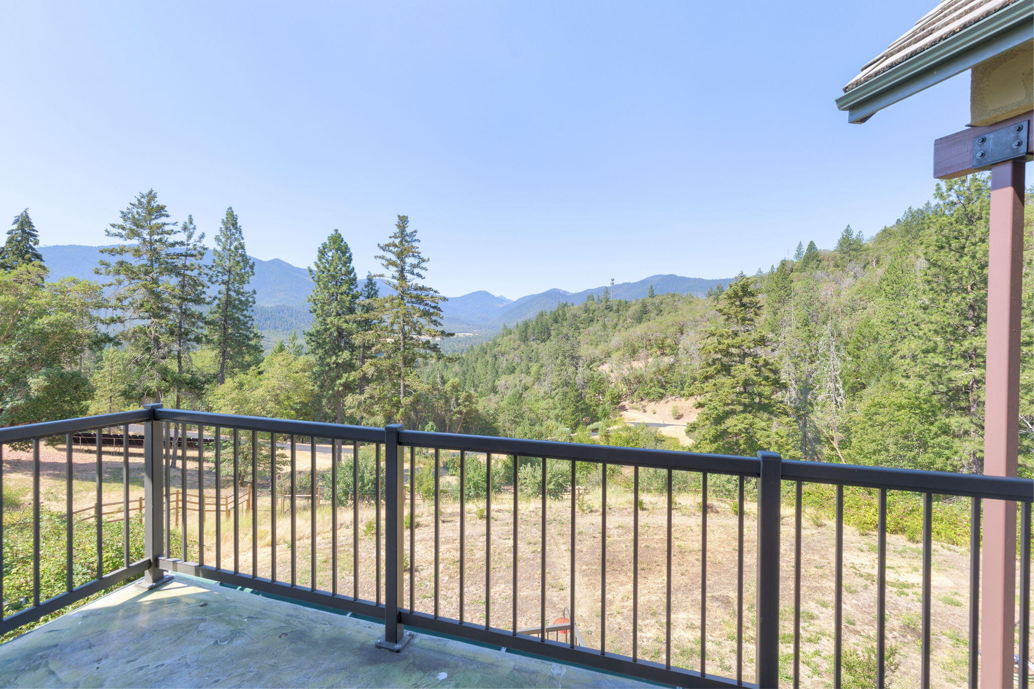 7304 North Applegate Road Grants Pass, OR 97527 - Photo 65 of 87 a view of a balcony with an outdoor space