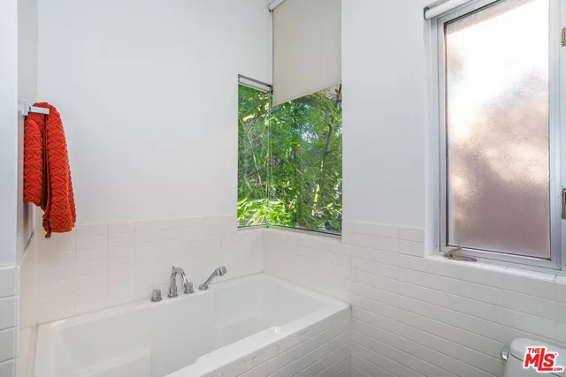 a bathroom with a sink and a bathtub
