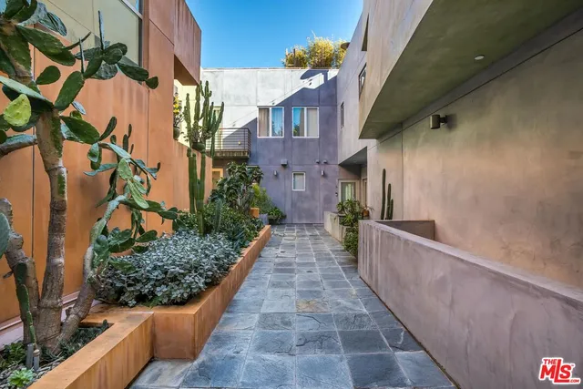 a view of a pathway both side of building