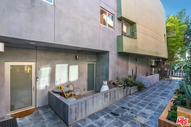 a view of a pathway both side of building