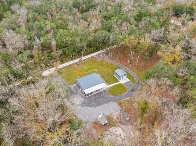 a view of yard with swimming pool