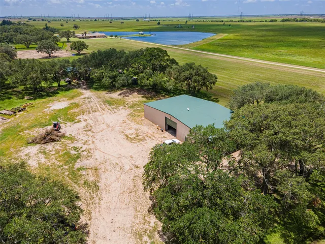 a view of a field with an ocean view