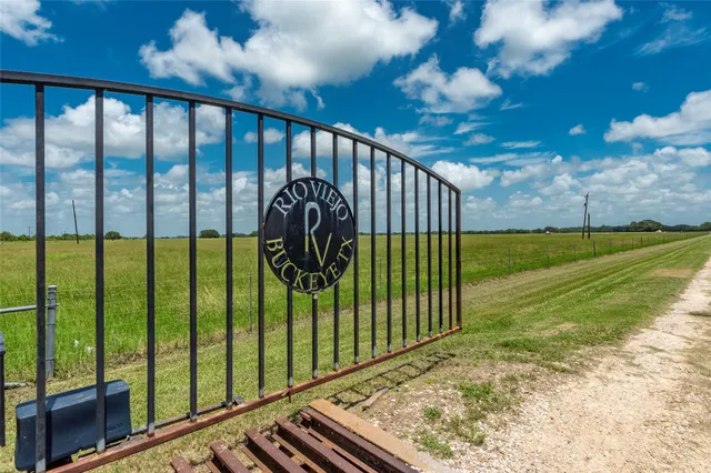 a view of swimming pool with furniture