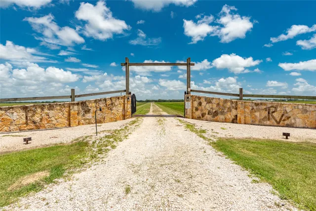 a kitchen with stainless steel appliances granite countertop a stove and a refrigerator