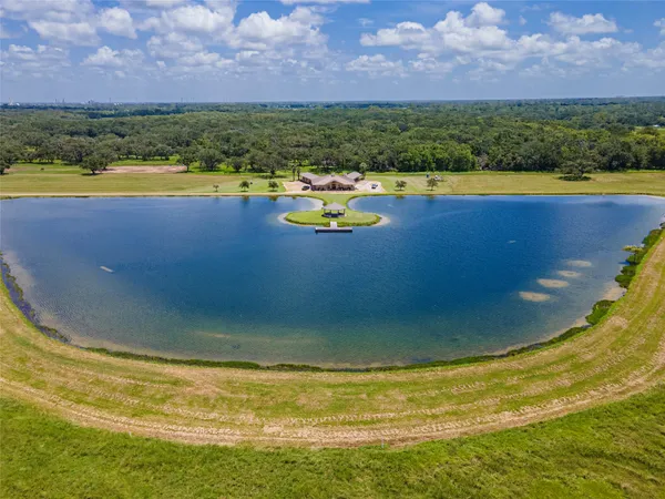 a view of a swimming pool with an ocean view