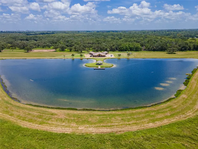 a view of a swimming pool with an ocean view