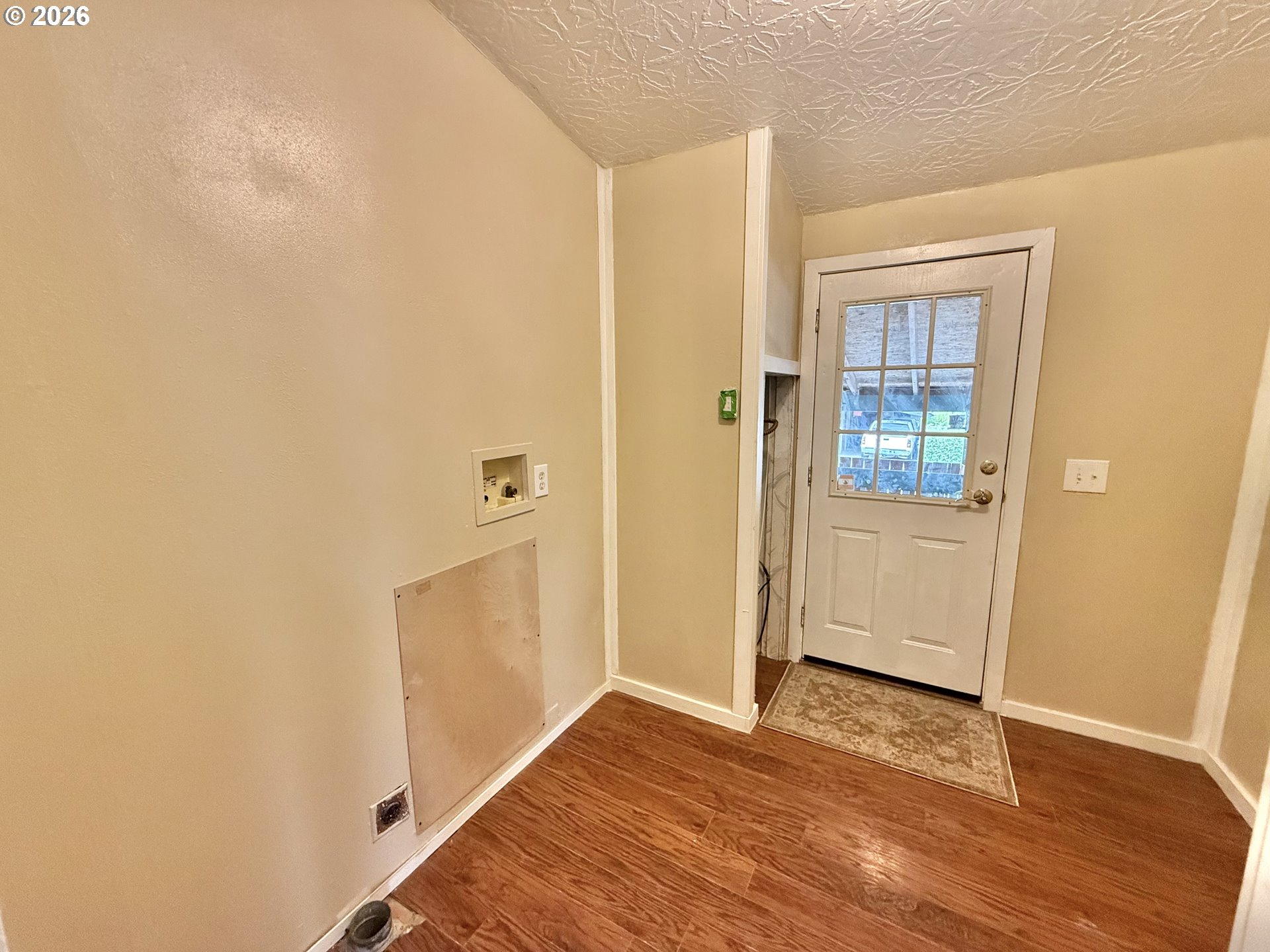 1282 3rd Street, Unit 37 Lafayette, OR 97127 - Photo 13 of 28 a view of a hallway with wooden floor