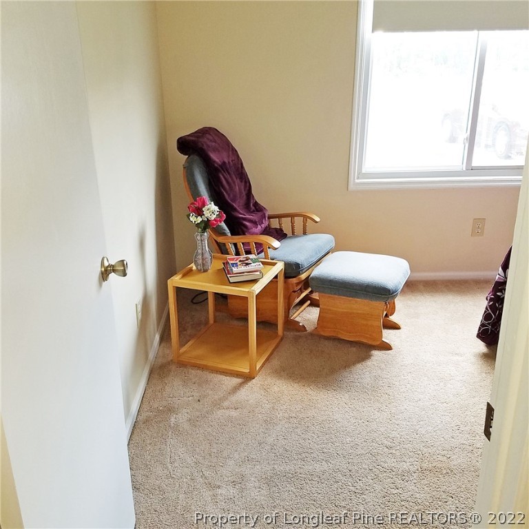 6596 Fisher Road Fayetteville, NC 28304 - Photo 19 of 27 a room with furniture and air conditioner