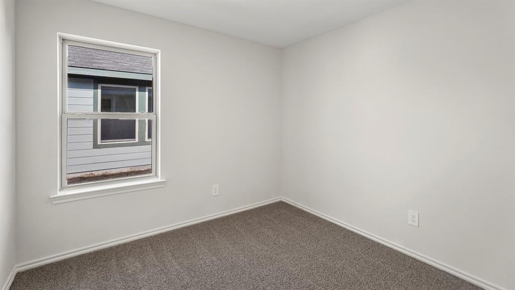 512 Yellow Rose Road Princeton, TX 75407 - Photo 13 of 37 a room that has a window in it