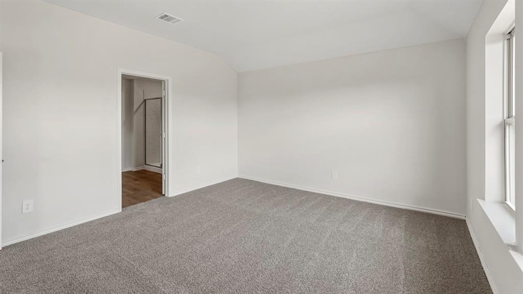 512 Yellow Rose Road Princeton, TX 75407 - Photo 18 of 37 a view of an empty room and window