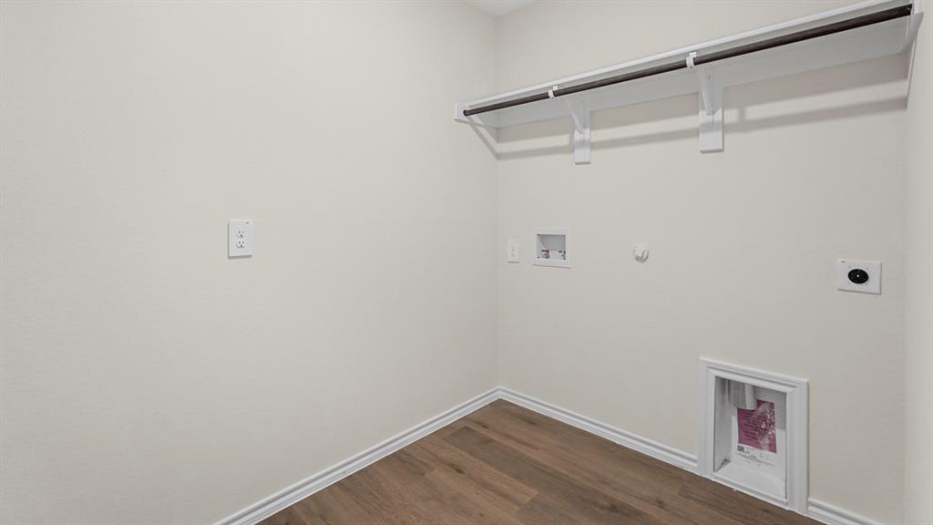 512 Yellow Rose Road Princeton, TX 75407 - Photo 31 of 37 a view of small space with racks on the wall