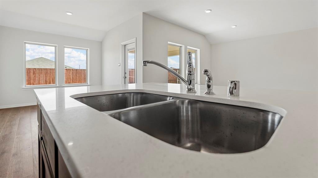 512 Yellow Rose Road Princeton, TX 75407 - Photo 36 of 37 a kitchen with a sink and a window