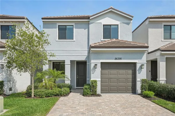a house view with a garden space