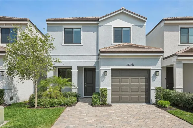 a house view with a garden space
