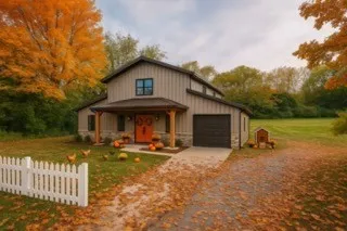 a view of a small house under a roof yard