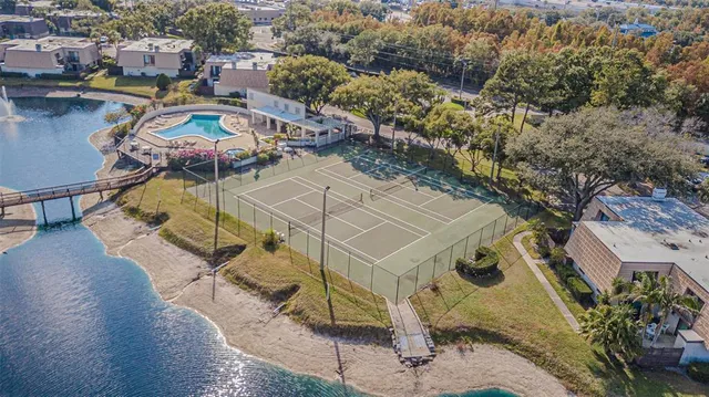 an aerial view of a house with a ocean view