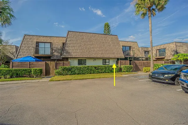 a house view with a garden space