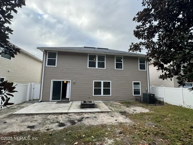 a view of a bathroom with a toilet