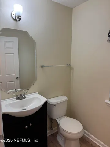 a view of a hallway with windows