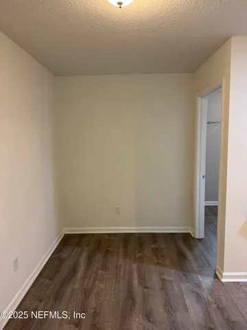 a view of small space with racks on the wall