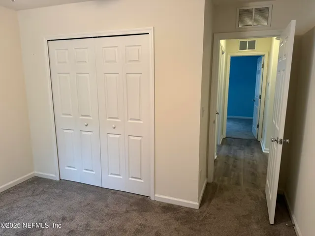 a bathroom with a tub and a window