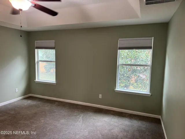 a view of a house with swimming pool